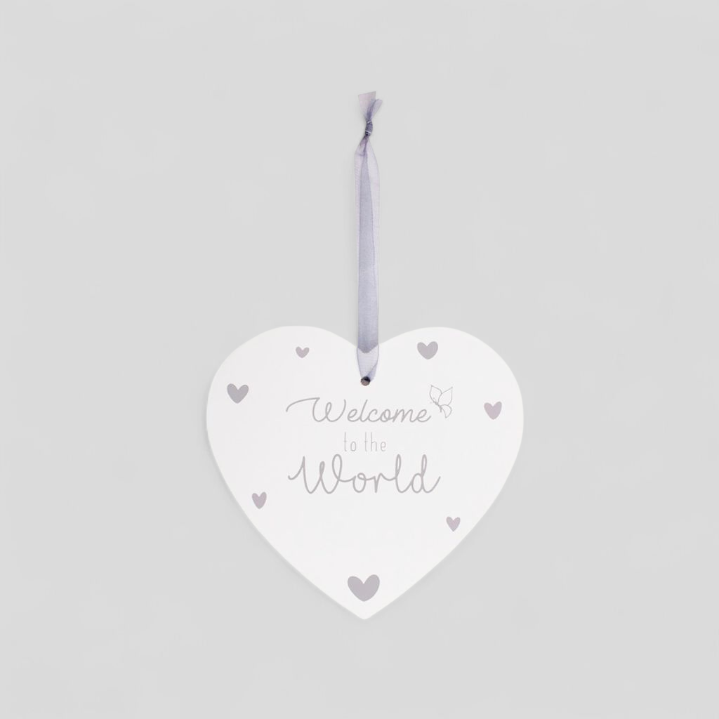 Heart-shaped hanging plaque with 'Welcome to the World' text 