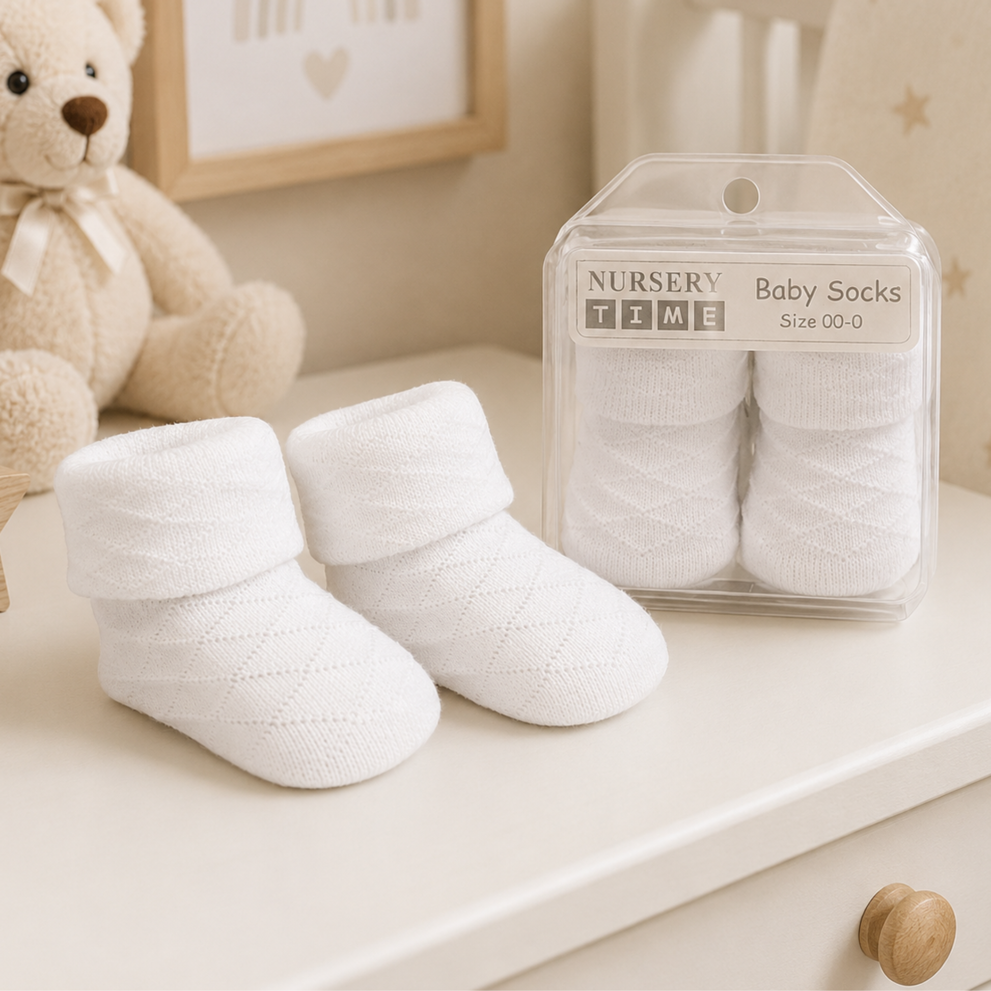 White newborn baby socks with diamond design in gift box
