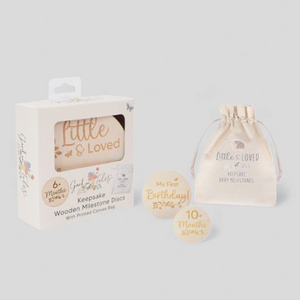 Packaging of Little & Loved wooden milestone discs with a drawstring bag
