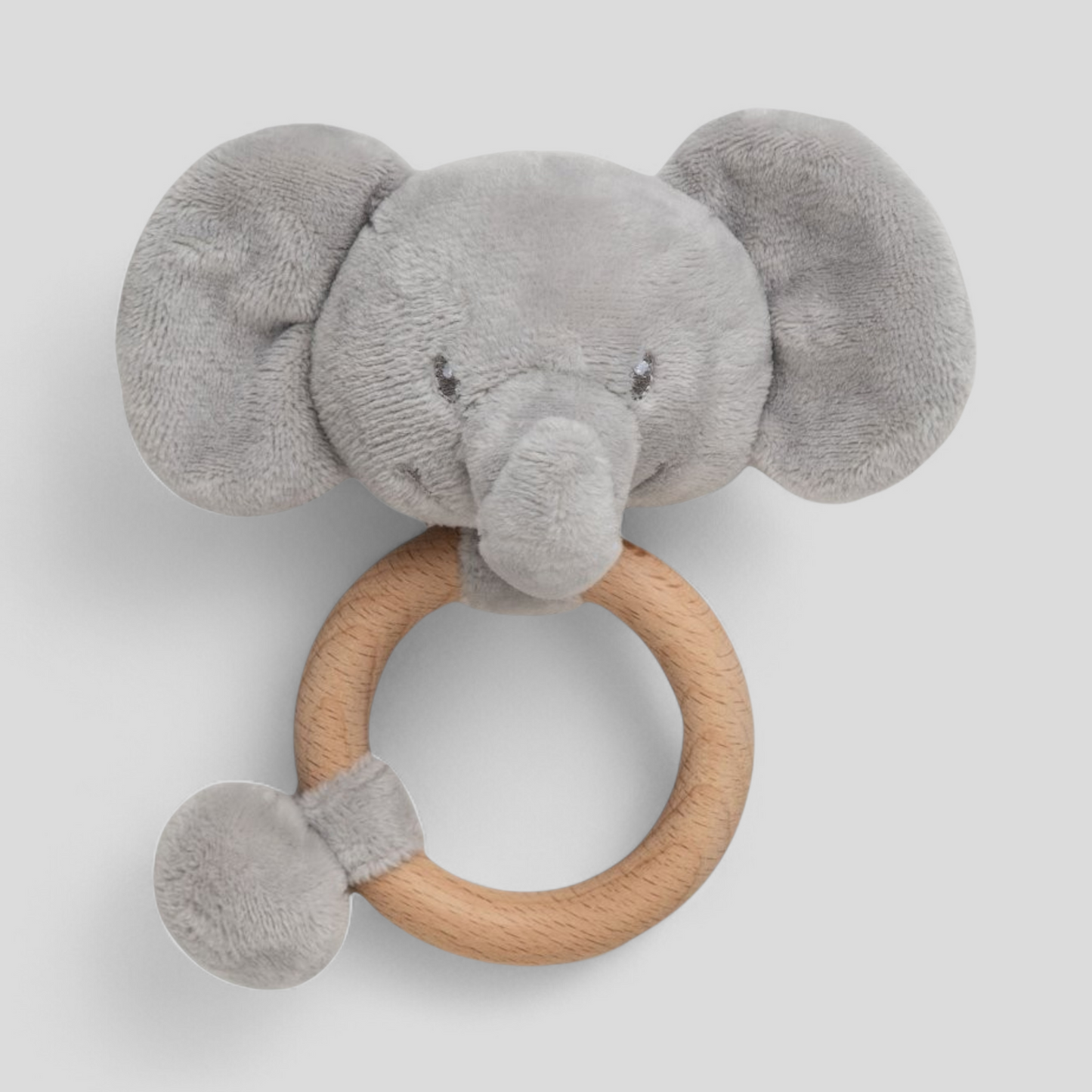 Gray elephant plush toy with a wooden ring 