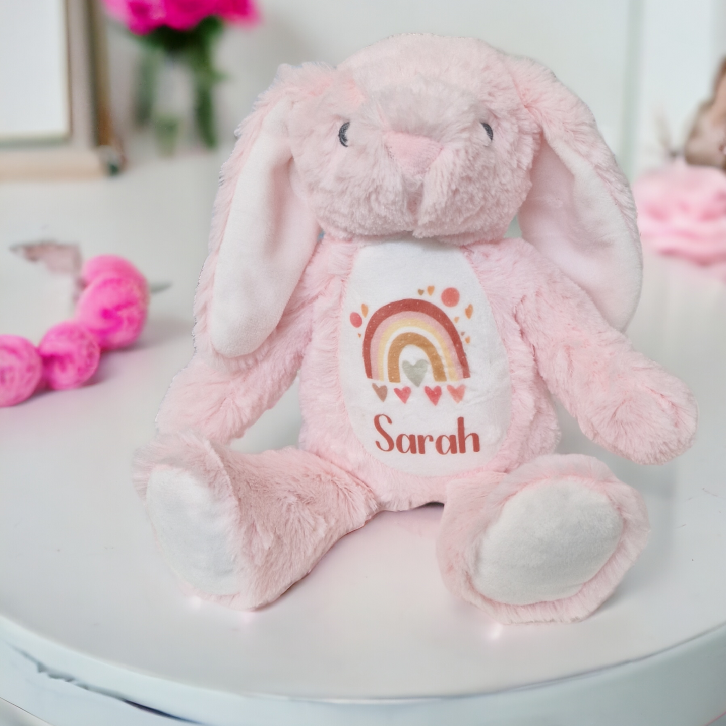 Pink personalised plush floppy bunny with rainbow – personalised baby toy and newborn gift from Ema and Boo