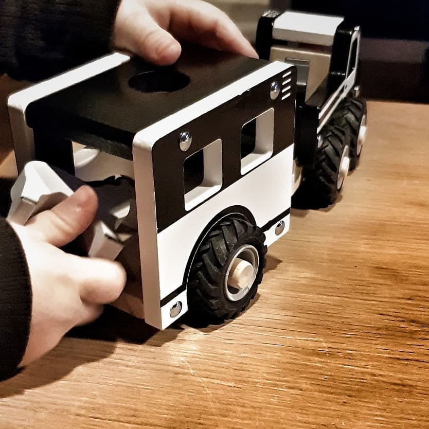 Wooden truck and horse trailer toy with two horses, working trailer gate and rubber wheels.